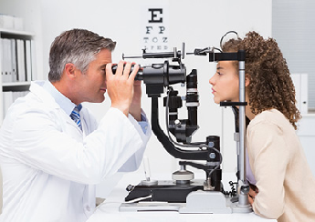 doctor performing eye exam